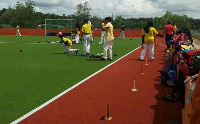 The state’s lawn bowlers during a training session at the hockey pitch in Petra Jaya recently.