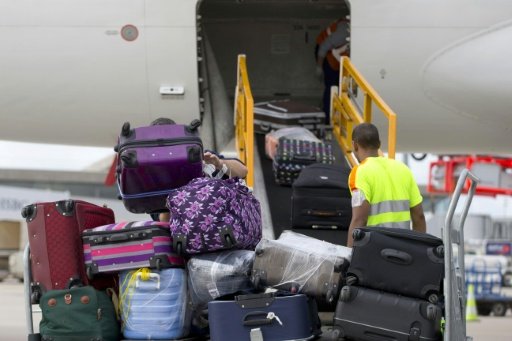 AFP/File | The UN agency responsible for air travel standards has banned the transportation of lithium-ion batteries as cargo on passenger aircraft, saying they pose a serious fire hazard 