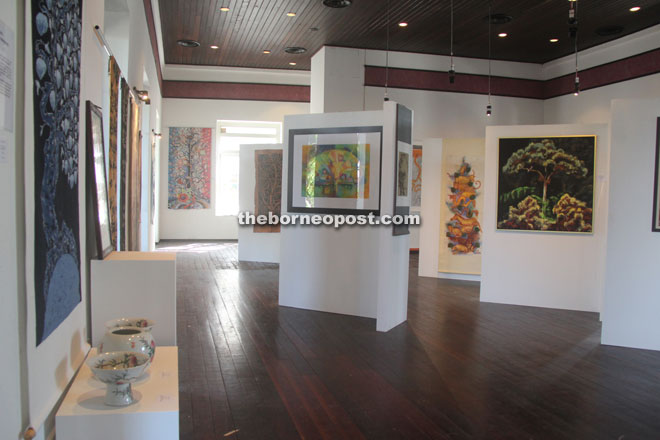 Artwork on display in the spacious gallery area on the upper floor.