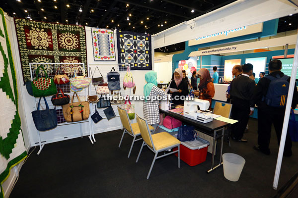 An academy offering sewing courses displays finished products.