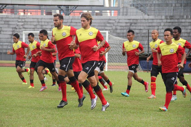 Sarawak players warming up before a training session.