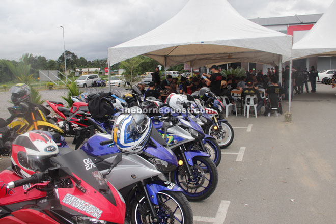 High-powered motorcycles line up near the spot at 1Singai Tondong where the bikers take their rest under a canopy.