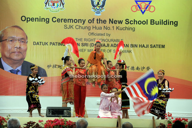 Pupils stage a multi-cultural dance for guests.