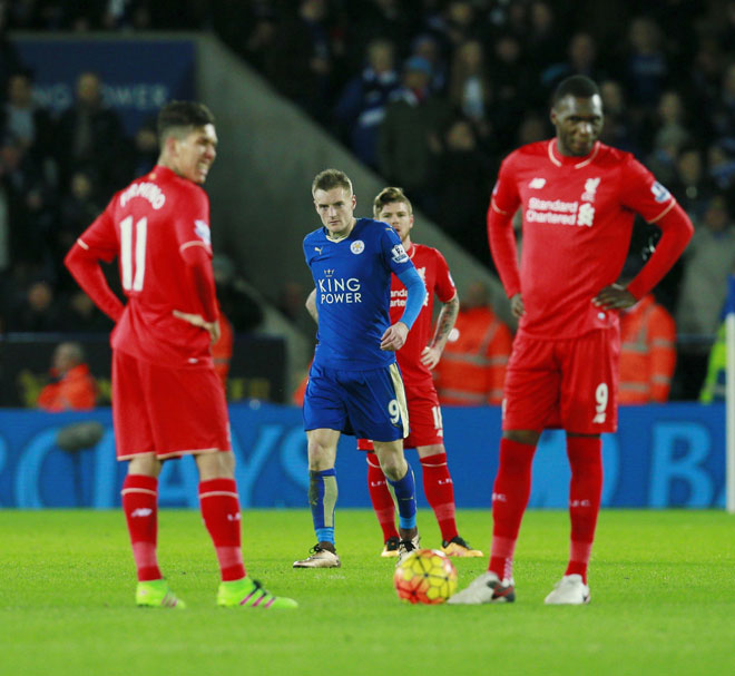 Jamie Vardy walks past Liverpool players after scoring the second goal for Leicester City during their Premier League match at King Power Stadium in this Feb 2 file photo. — Reuters photo