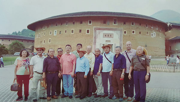 Nansian (centre) and Lee (4th right) with the Hakka delegates from Bau  and Kuching during a visit to China in 2013.