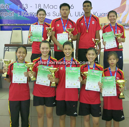 Recipients of the individual awards from the Sarawak contingent posing with their certificates.