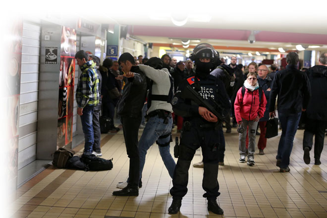 Police forces make searches inside the North station (Gare du Nord - Noordstation)  in Brussels, as stations are opened again with high security measures  after a series of apparently coordinated explosions that ripped through Brussels airport and the metro train, killing at least 14 people in the airport and 20 people in the metro in the latest attacks to target Europe. — AFP photo