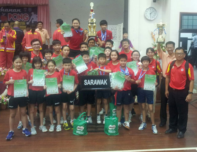 The Sarawak team posing with their medals and trophies at the end of the MSSM Table Tennis Championship in Kelantan.