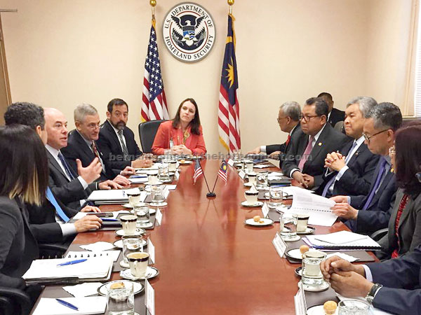Ahmad Zahid (seated fourth right) and the Malaysian delegation meeting with Mayorkas (third left) and his group during the working visit to the United States. —  Bernama photo