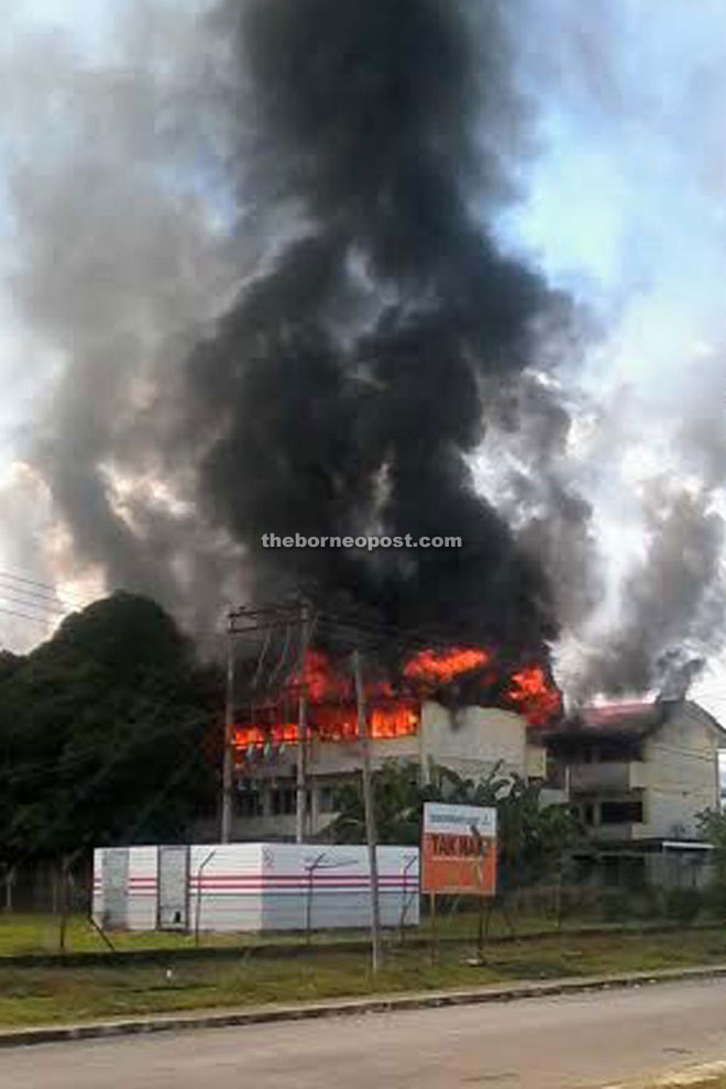 The girls' hostel on fire at SMK Tandek yesterday.