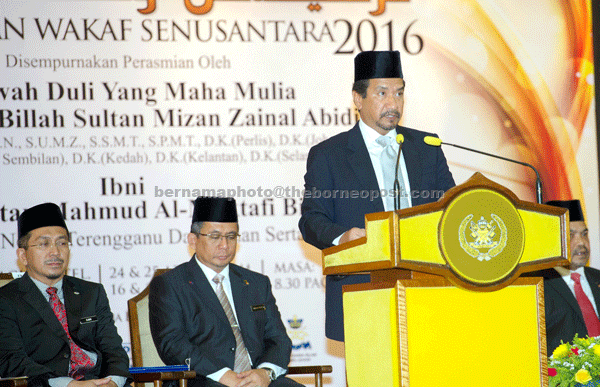 Sultan Mizan speaking during the launching of the regional conference. Ahmad Razif is seated second left. —Bernama photo