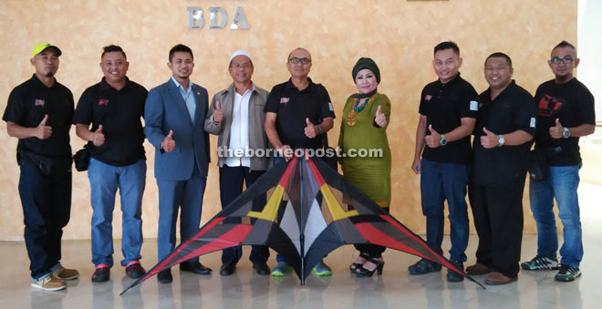 Bohari (fourth from left), Azman (centre) BDA secretary Siti Aishah Othman and Team Silat members raring to make Malaysia proud. 