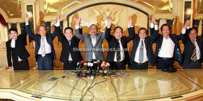 Adenan (fourth left) in a jubilant mood after announcing the five direct BN candidates yesterday. From left are Rayong, Tiong, UPP secretary general George Lo, Wong, Dr Jerip, Hii and Ranum. 