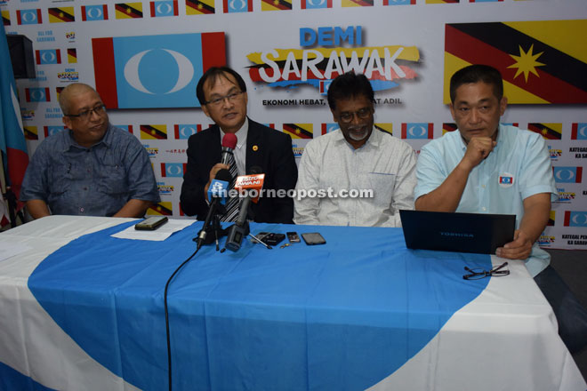 Baru (second left) speaking during the press conference while (from left) PKR central elections department operations manager Ismail Yusop, Dr Xavier and state PKR vice chairman See Chee How look on.