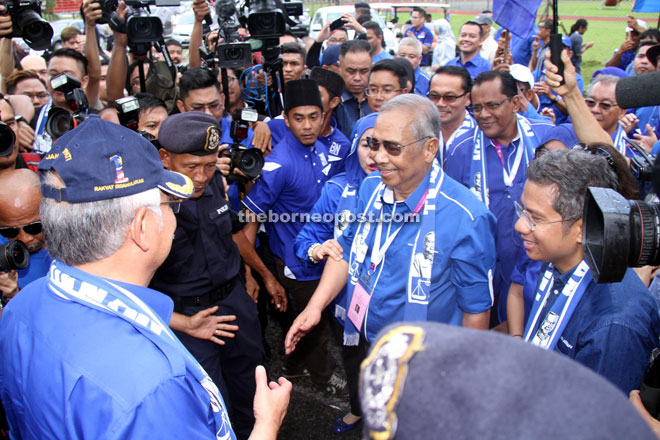 Adenan (second right) meeting up with Najib (left) after the nomination for Tanjung Datu constituency at Lundu District Office closed yesterday.