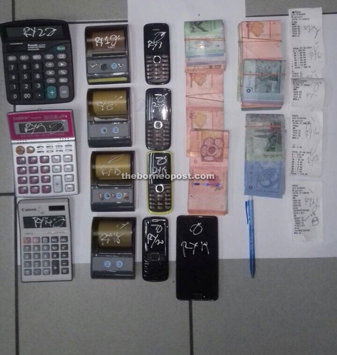 Items used for illegal lottery activities which have been seized by police.