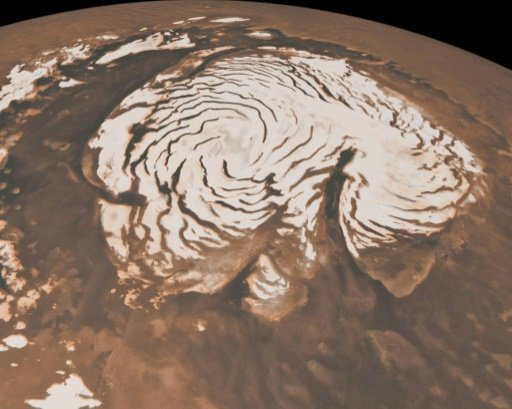 This May 27, 2010 NASA image, combining data from two instruments aboard NASA's Mars Global Surveyor, depicts an orbital view of the north polar region of Mars -NASA/AFP photo