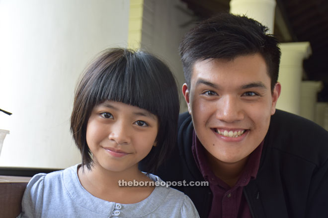 Philip (right) with Anastazia who plays little Renai.