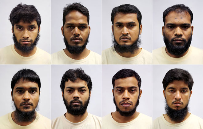This undated handout photograph released by Singapore’s Ministry of Home Affairs on May shows eight detained Bangladeshi nationals (from top row left to right) Islam Shariful, Md Jabath Kysar Haje Norul Islam Sowdagar, Sohag Ibrahim, Zzaman Daulat, (bottom row left to right) Sohel Hawlader Ismail Hawlader, Rahman Minazur, Miah Rubel, and Mamun Leakot Ali who were arrested for allegedly plotting terror attacks in their home country, in Singapore. — AFP photo