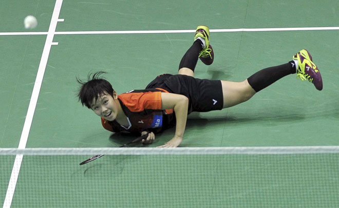 Goh Jin Wei plays a return during the women’s singles match against Mette Poulsen of Denmark. — Bernama photos