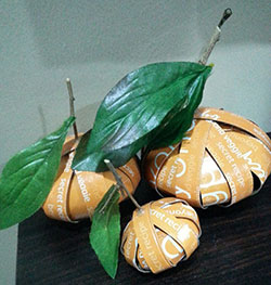 Chinese New Year oranges made from cardboard boxes by Yeo.  