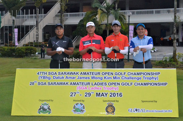 Sarawak GA president Hoan Kee Hock (second left) posing with the golfers on his same flight prior to the start of the 47th SGA Sarawak Amateur Open at Kelab Golf Sarawak in Petra Jaya yesterday. — Photo courtesy of KGS