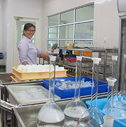 Dr Lulie inside the cleaning room of TPRL.