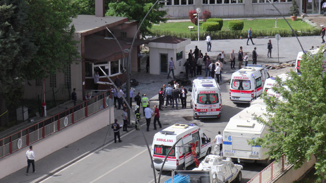 Police forensic experts inspect the scene after an explosion in front of the city’s police headquarters in Gaziantep, Turkey. — Reuters photo