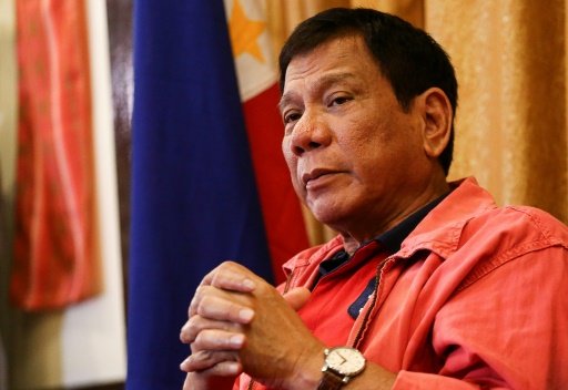 Rodrigo Duterte speaks to reporters in Davao City, on May 26, 2016. Photo by AFP