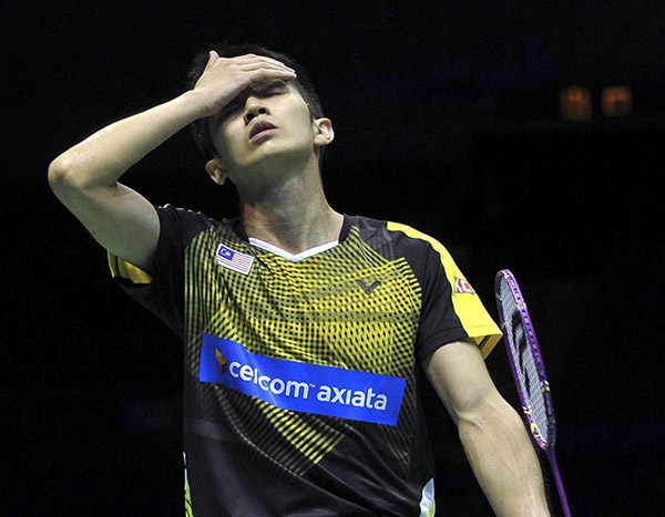 Malaysia’s Chong Wei Feng reacts after losing the fifth match of the semi-finals to Denmark’s Emil Holst 21-15, 21-18. — Bernama photo