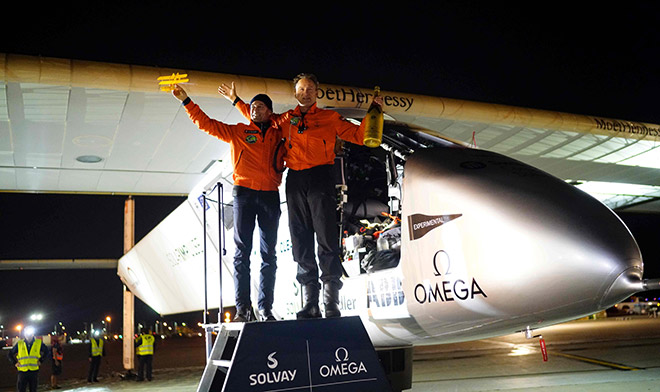 Solar Impulse 2 shows Swiss founders and pilots Bertrand Piccard (left) and André Borschberg (right) with the experimental solar-powered aircraft after landing in Dayton, Ohio. The solar-powered plane landed in Dayton, Ohio on the latest leg of a record-breaking trip to circle the globe without consuming a drop of fuel. — AFP photo