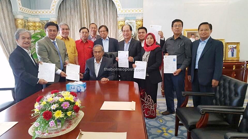 Adenan (seated) and Awang Bujang (right) with all six BN direct assemblypersons including Mawan (second left). Also seen are PBB deputy president Datuk Amar Abang Johari Tun Openg; senior vice president Datuk Amar Awang Tengah Ali Hassan and; secretary general Datuk Dr Stephen Rundi.