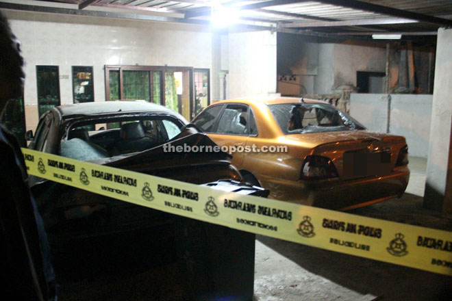 The damaged cars belonging to the suspects. 