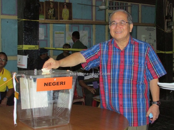 Datuk Amar Douglas Uggah seen casting his vote at Rumah Panjai Penom, Ulu Paku, Betong.