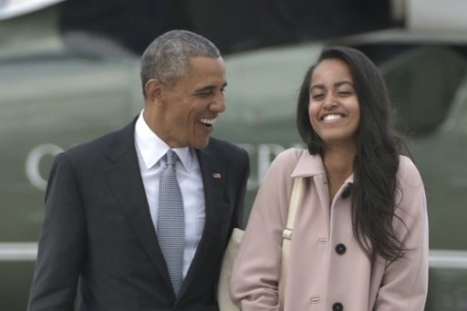 US President Barack Obama and daughter Malia pictured together in Chicago on April 7, 2016 -AFP