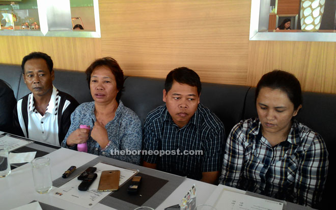 Lenduk (second left) flanked by her brother Junggoh Baling (left), brother-in-law Lunchong Gangsi (second right) and Jumai at the press conference yesterday.