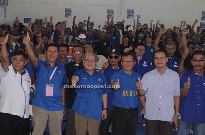 (From left) Rungka, John, Uggah, Martin and others give their best thumbs-up during a photo call.