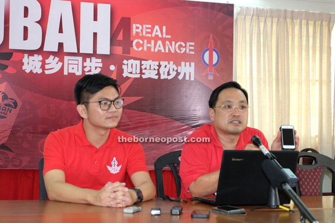 Chong (right) and DAP candidate for Padungan Wong King Wei at the press conference.  