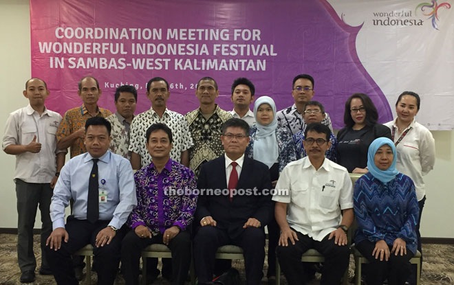 Jahar (seated centre) and Edi (seated second right) in a group photo with the festival’s committee members after the press conference.