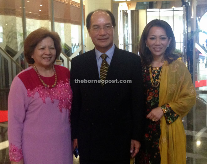 Gerawat (middle) and wife Datin Esther Balan (right) with Political Secretary to the  Chief Minister, Kijan Toynbee after the swearing-in ceremony at the DUN’s lobby.