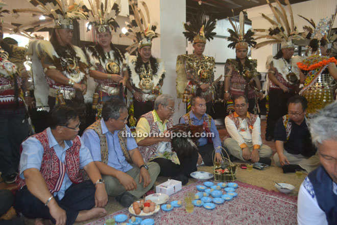 The ‘miring’ ceremony in session at Fort Sylvia. Seated, from left are Jamit, Nyabong, Masing, Elvis, Jaul Samion and Dominic.