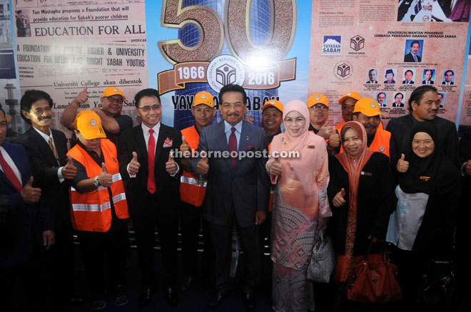 Musa with Rosmawati (front, third right) together with other invited guests in a group photo during the  Yayasan Sabah 50th Anniversary yesterday.