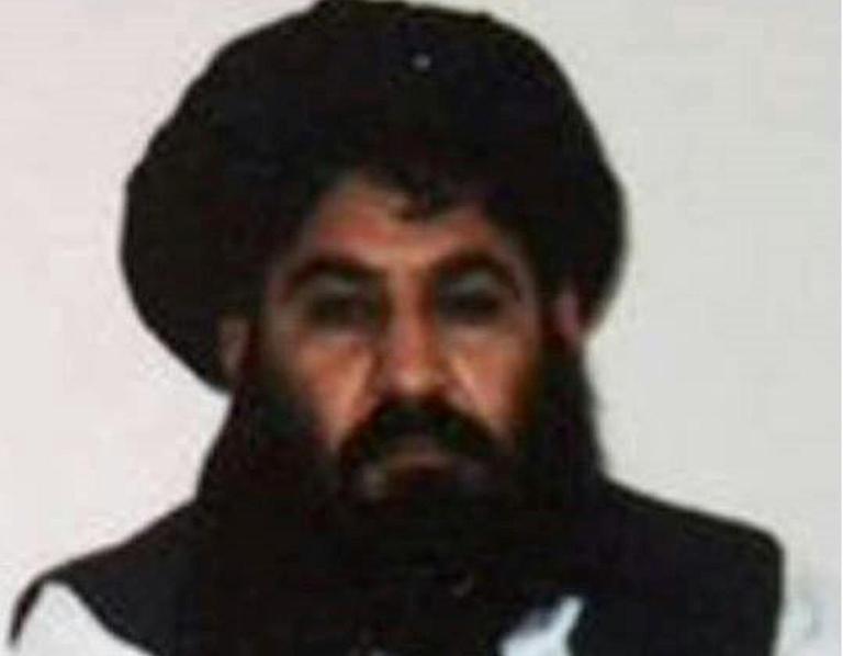 This handout photograph released by The Afghan Taliban on December 3, 2015, which was taken on a mobile phone in mid-2014 is said to show Afghan Taliban leader Mullah Akhtar Mansour posing for a photograph at an undisclosed location in Afghanistan. AFP File Photo