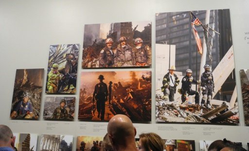 Visitors look at the "Hope at Ground Zero" exhibit at the 9/11 Memorial Museum's south tower gallery, by Thomas Urbain | AFP photo