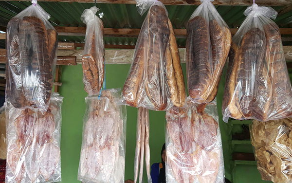 Dried squid and sea cucumber are available at the market.