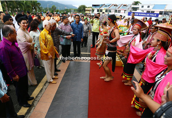 Members of a traditional troupe perform a special welcome dance for the VIPs upon their arrival at Serian Community Hall.