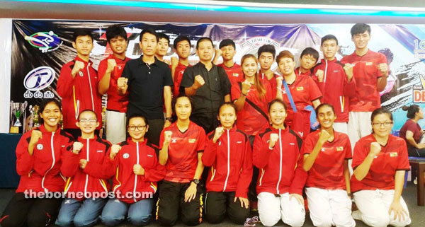 State athletes and officials with Tan (second row, fourth left) and Kochphoom (second row third left) during the closing ceremony in Bangkok recently. 