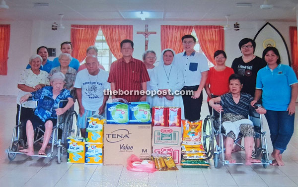 Lim (standing front row, fourth left) seen in Landeh recently. Jerome is standing fourth right.