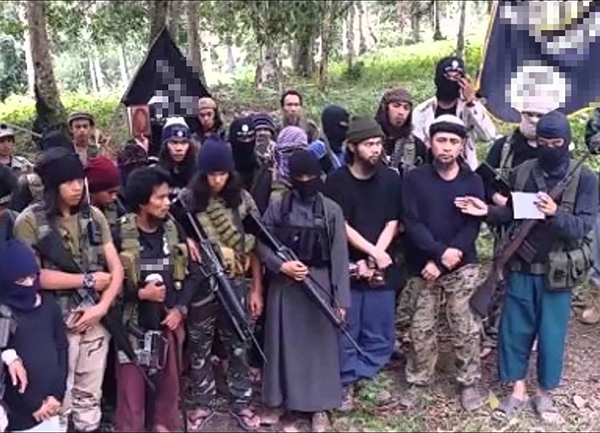 A screen grab shows a group of Abu Sayyaf militants. 