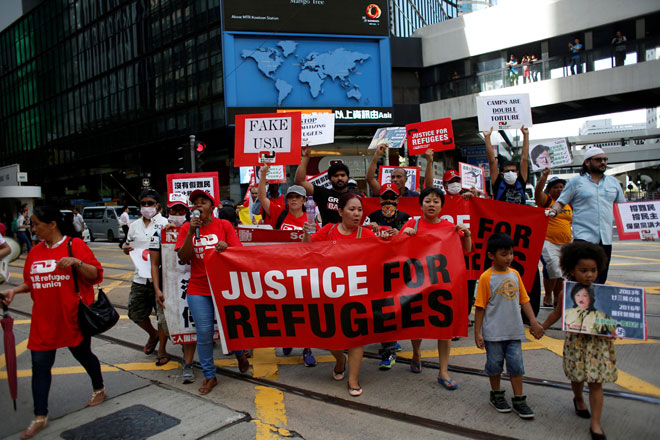 Refugees and their supporters protest to mark World Refugee Day in Hong Kong, China. — Reuters photo